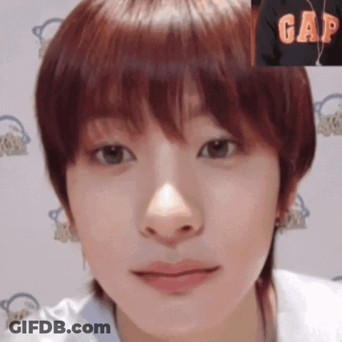 Close Up Of Woman's Face With Gap Hoodie Background GIF