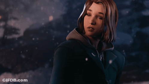 A Close Up Of A Woman 'S Face With A Hoodie That Has A Bird On It GIF