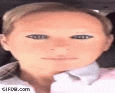 A Close Up Of A Woman 'S Face With A Mask On Her Eyes GIF