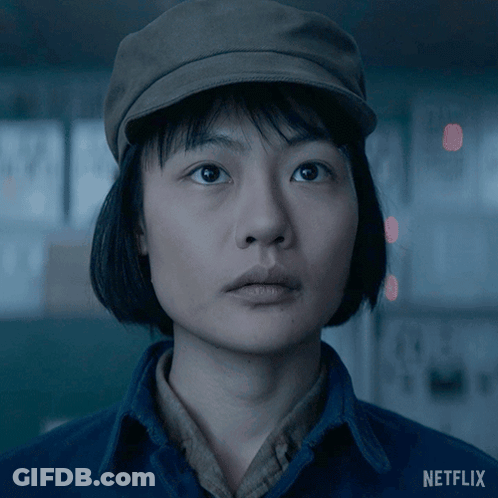 A Close Up Of A Woman 'S Face With A Netflix Logo In The Corner GIF