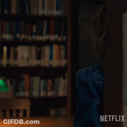 A Close Up Of A Woman 'S Face With A Netflix Logo In The Corner GIF