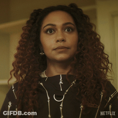 A Close Up Of A Woman 'S Face With A Netflix Logo In The Corner GIF
