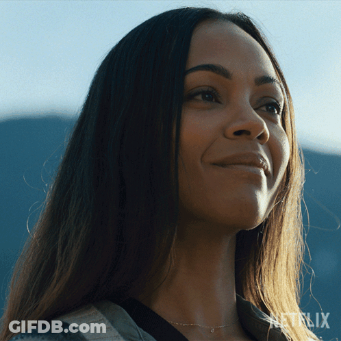 A Close Up Of A Woman 'S Face With A Netflix Logo In The Corner GIF