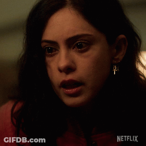 Close Up Of Woman's Face With Netflix Logo GIF