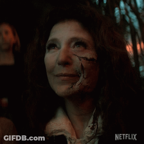 Close Up Of Woman's Face With Netflix Logo GIF