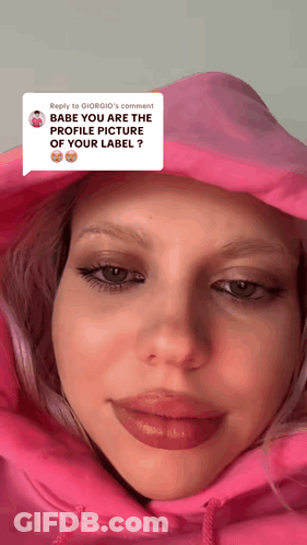 A Close Up Of A Woman 'S Face With A Reply To Giorgio 'S Comment Below It GIF