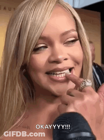 A Close Up Of A Woman 'S Face With A Ring On Her Finger And The Words `` Okay Yy ! '' GIF