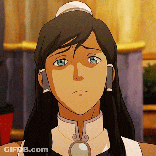 A Close Up Of A Woman 'S Face With A Sad Look On Her Face GIF