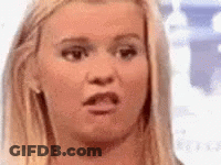A Close Up Of A Woman 'S Face With A Shocked Look On Her Face . GIF