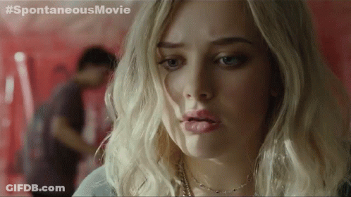A Close Up Of A Woman 'S Face With A # Spontaneousmovie Written On The Bottom GIF