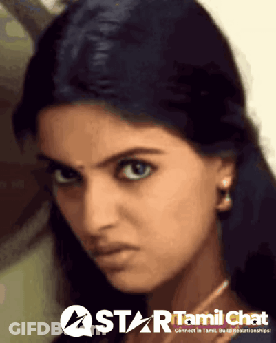 A Close Up Of A Woman 'S Face With A Star Tamil Chat Logo In The Corner GIF