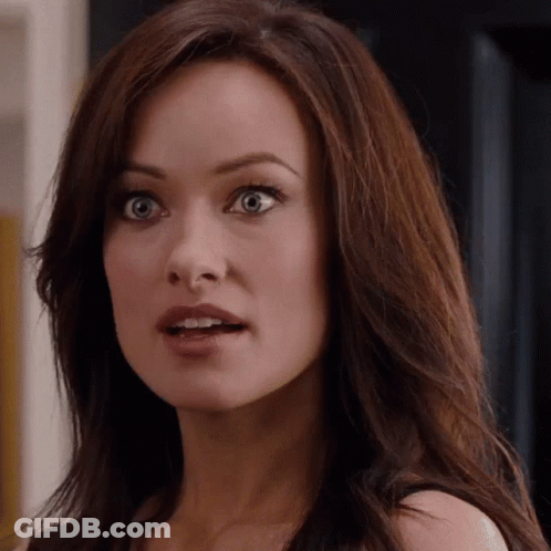 A Close Up Of A Woman 'S Face With A Surprised Expression GIF