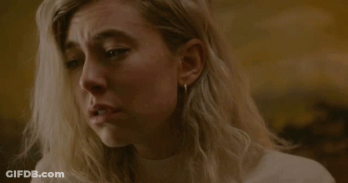 A Close Up Of A Woman 'S Face With A Tear Running Down Her Cheek GIF
