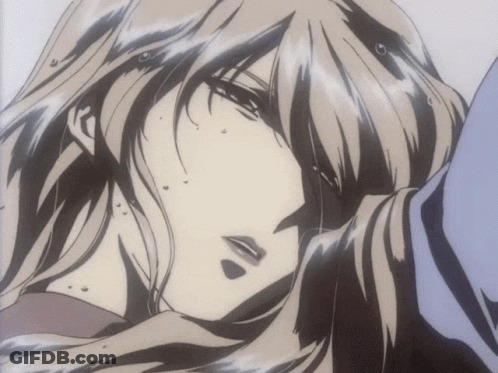 A Close Up Of A Woman 'S Face With A Very Long Hair GIF