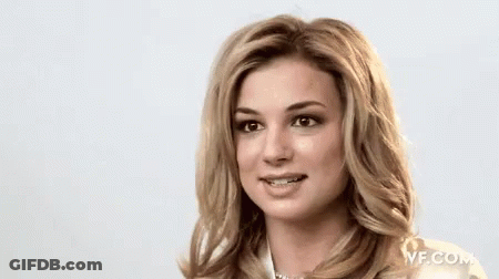 A Close Up Of A Woman 'S Face With A Vf.com Logo In The Corner GIF