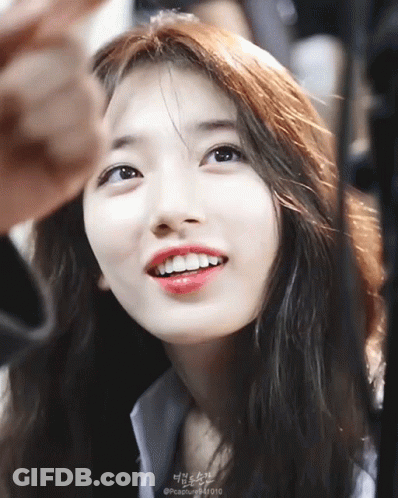 A Close Up Of A Woman 'S Face With A Watermark That Says @Capture94d10 GIF