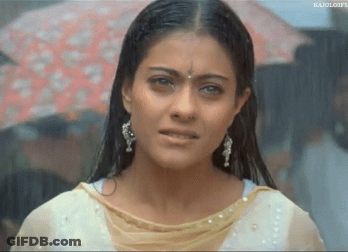 A Close Up Of A Woman 'S Face With A Watermark That Says ' Kajol Gifs ' On It GIF