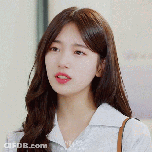 A Close Up Of A Woman 'S Face With A Watermark That Says Peablue941810 GIF