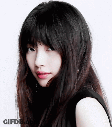 A Close Up Of A Woman 'S Face With A White Background And The Words ' Korean ' On The Bottom GIF