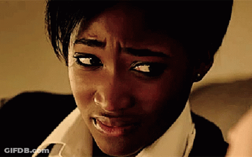 A Close Up Of A Woman 'S Face With A Wrinkle On Her Forehead GIF