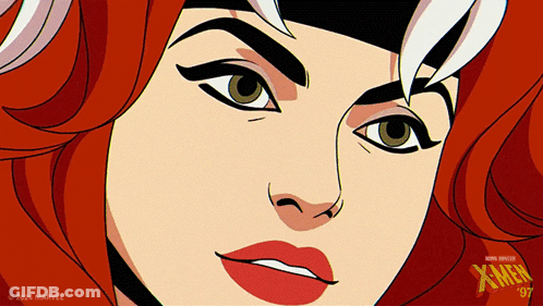 A Close Up Of A Woman 'S Face With A X-Men Logo In The Corner GIF