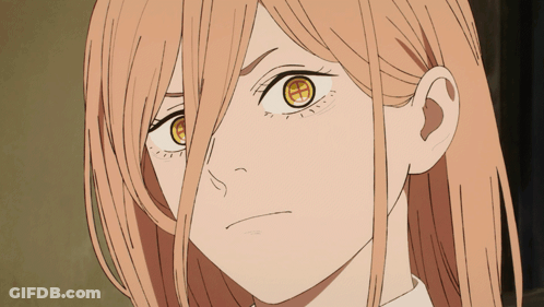 A Close Up Of A Woman 'S Face With A Yellow Eye GIF