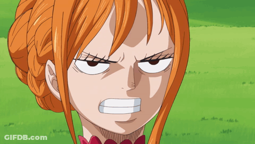 A Close Up Of A Woman 'S Face With An Angry Expression GIF