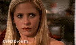 Blonde Woman With Yellow Necklace Close Up GIF
