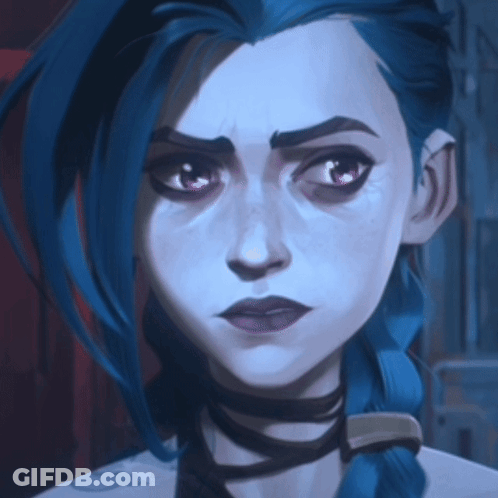 A Close Up Of A Woman 'S Face With Blue Hair GIF