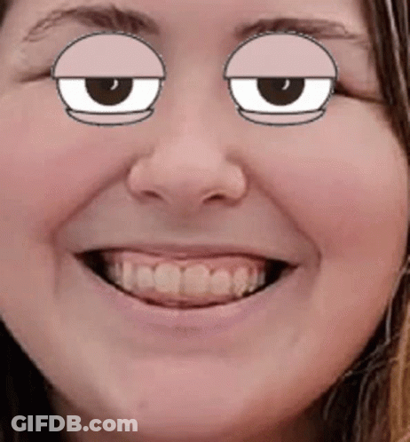 A Close Up Of A Woman 'S Face With Cartoon Eyes And A Smile . GIF