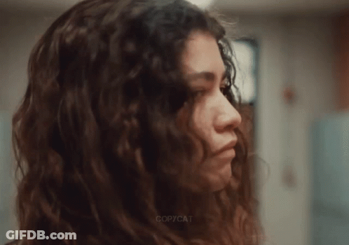 A Close Up Of A Woman 'S Face With Copycat Written On The Bottom Right GIF