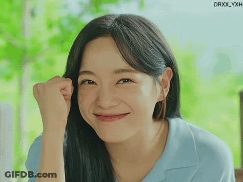 A Close Up Of A Woman 'S Face With Drxx_yxh Written On The Bottom Right GIF