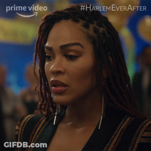 A Close Up Of A Woman 'S Face With #Harlem Ever After Written On The Bottom GIF