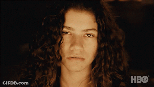 A Close Up Of A Woman 'S Face With Hbo Written On The Bottom GIF