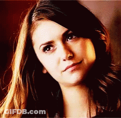 A Close Up Of A Woman 'S Face With Her Eyes Closed GIF