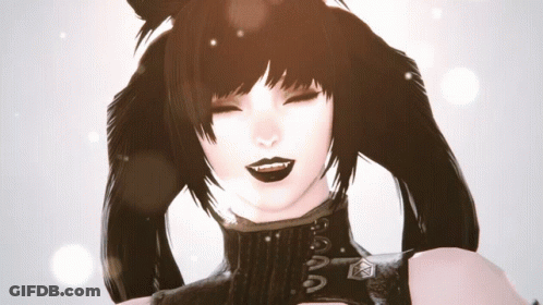 A Close Up Of A Woman 'S Face With Her Eyes Closed And A Black Sweater On GIF