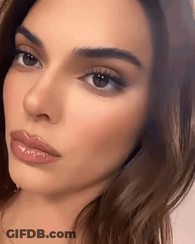 Woman Face With Closed Eyes And Glossed Lips GIF