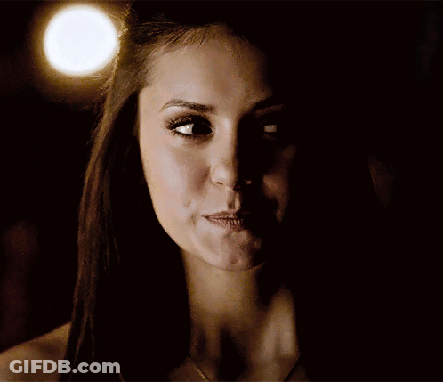 A Close Up Of A Woman 'S Face With Her Eyes Closed GIF
