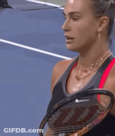 A Close Up Of A Woman 'S Face With Her Eyes Closed GIF