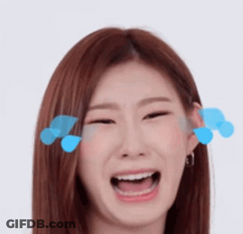 A Close Up Of A Woman 'S Face With Her Mouth Open And Blue Bubbles Coming Out Of Her Eyes . GIF