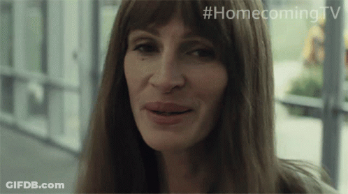 A Close Up Of A Woman 'S Face With #Homecoming Tv Written On The Bottom Right GIF