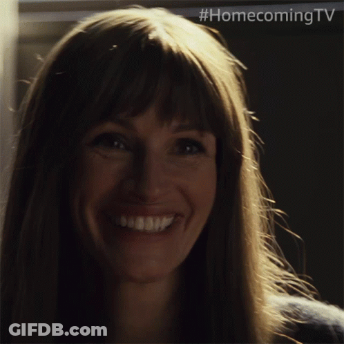 A Close Up Of A Woman 'S Face With #Homecomingtv Written On The Bottom GIF