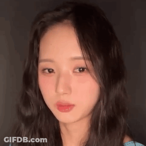 Woman With Long Hair And Blue Shirt GIF