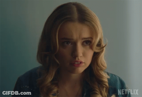 A Close Up Of A Woman 'S Face With Netflix Written On The Bottom GIF