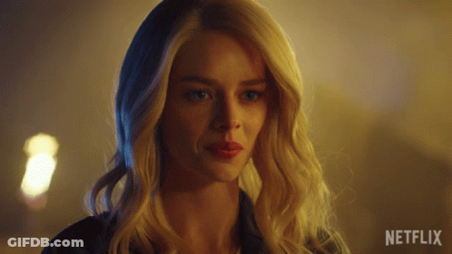 A Close Up Of A Woman 'S Face With Netflix Written On The Bottom GIF