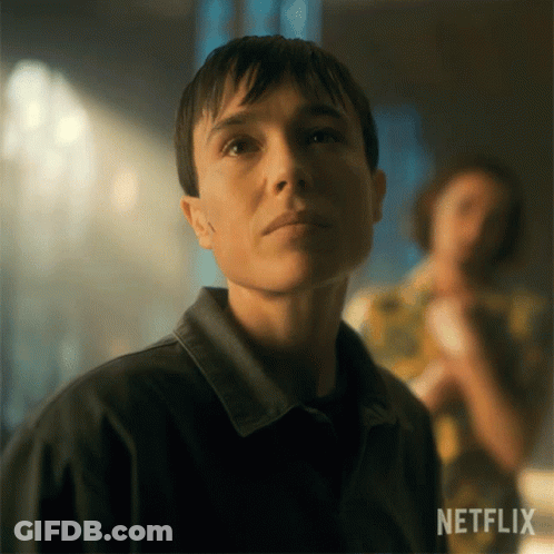 A Close Up Of A Woman 'S Face With Netflix Written On The Bottom GIF