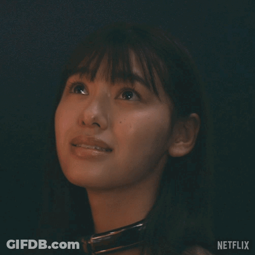 A Close Up Of A Woman 'S Face With Netflix Written On The Bottom Right GIF