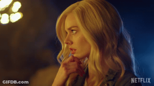 A Close Up Of A Woman 'S Face With Netflix Written On The Bottom Right GIF