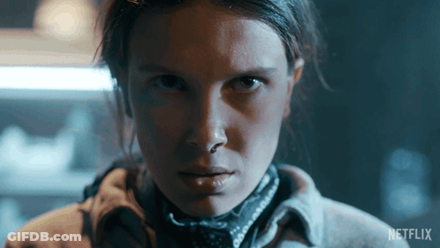 A Close Up Of A Woman 'S Face With Netflix Written On The Bottom Right GIF