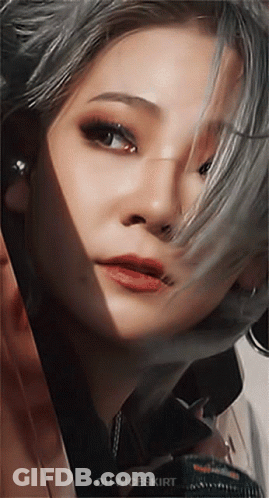 A Close Up Of A Woman 'S Face With Oh-Niceskirt Written On The Bottom Right GIF